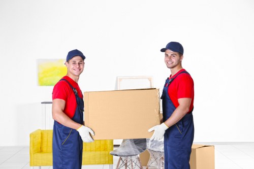 Preparation scene for urgent removals with boxes and furniture